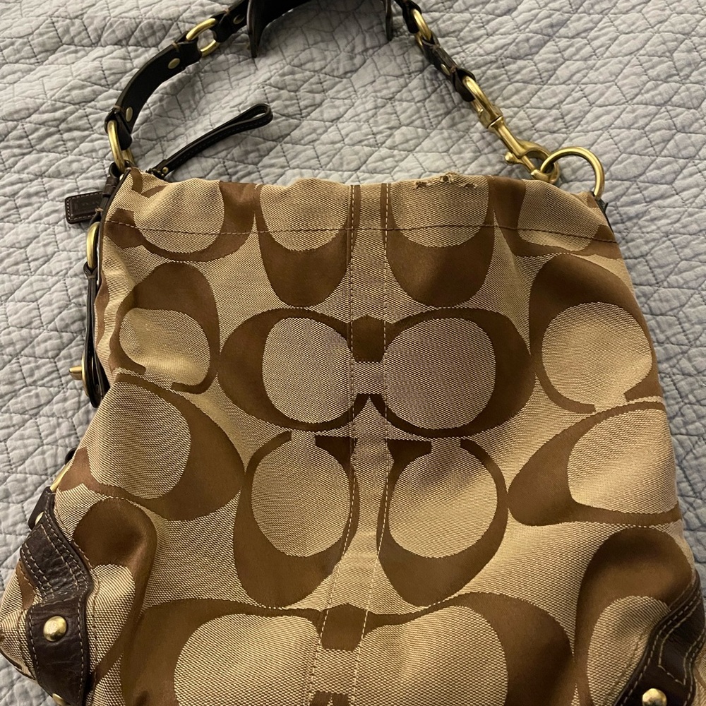 Coach Carly Signature Hobo Tan and Brown Shoulder Slouch Bag.